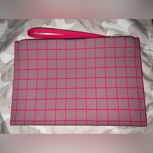 rothy's the wristlet in desert pink windowpane